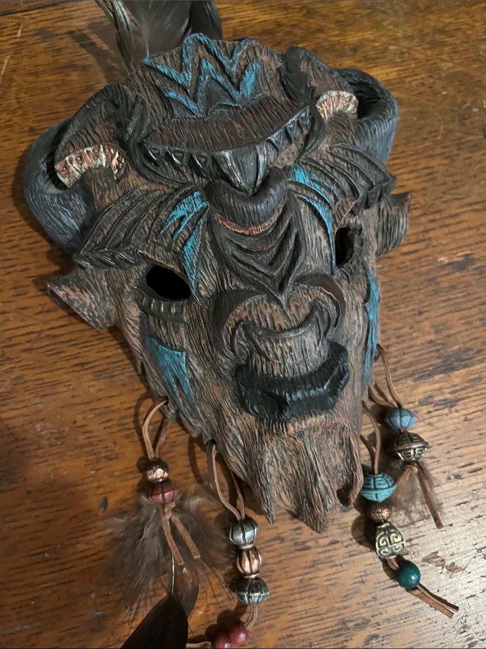 Hand-Carved Tribal Buffalo Mask Wall Art in Brown with Teal Accents